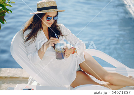 girl by the pool 54071857