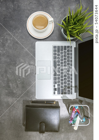 Top view of business desk with laptop 54073644