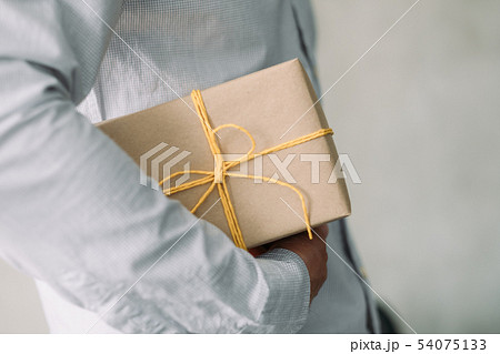 goods delivery service business man wrapped box 54075133