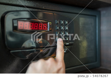 Finger are pressing the number keys of electric Finger are pressing the number keys of electric 54078267