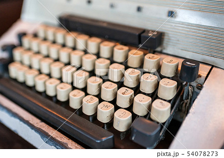 Obsolete classic typewriter with Thai keyboard Obsolete classic typewriter with Thai keyboard 54078273