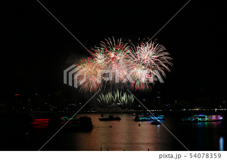 colorful short tail fireworks on beach and 54078359