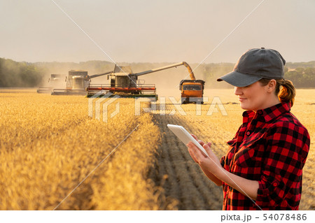 Woman farmer with digital tablet  54078486
