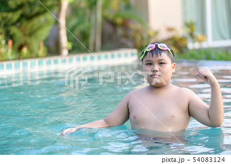 Chubby boy in swimsuit  