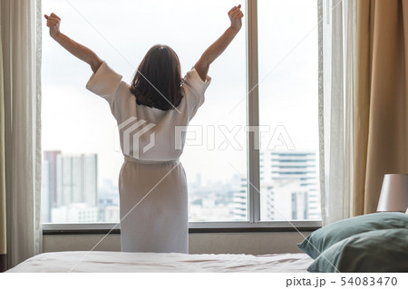 Easy lifestyle Asian woman waking up in weekend 54083470