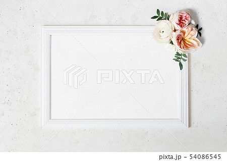 Wedding, birthday sign board mock-up scene. Blank white wooden frame. Decorative floral corner 54086545