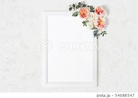 Wedding, birthday sign board mock-up scene. Vertical white wooden frame. Decorative floral corner 54086547