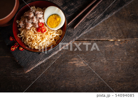 Instant noodle with pork, egg and vegetables on Instant noodle with pork, egg and vegetables on 54094085