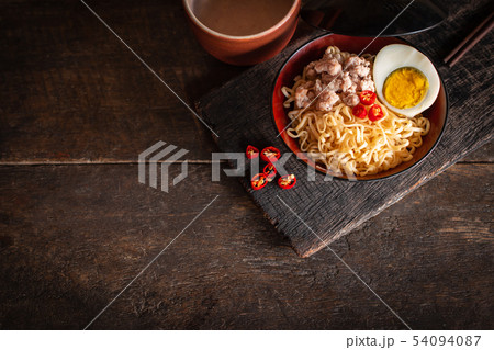 Instant noodle with pork, egg and vegetables on Instant noodle with pork, egg and vegetables on 54094087