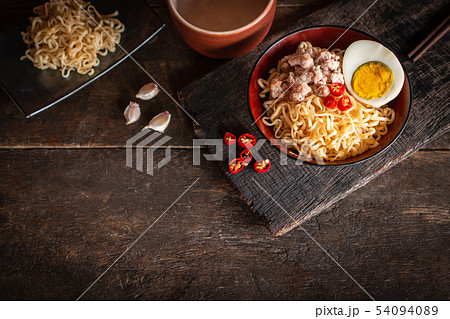 Instant noodle with pork, egg and vegetables on Instant noodle with pork, egg and vegetables on 54094089