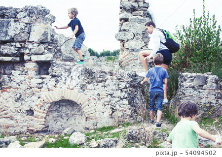 mother with little sons on vacation visiting ancient colosseum, summer tourism, lifestyle people 54094502