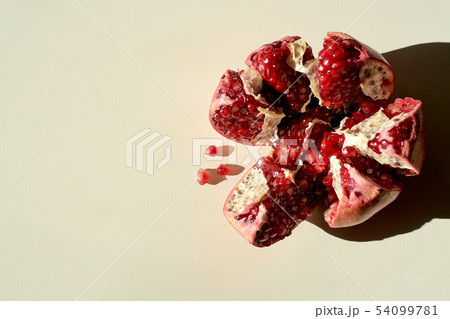 Ripe red juicy pomegranate. Grains pomegranate 54099781