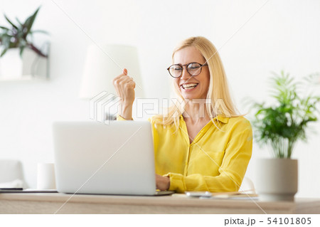 Achieve Success. Mature Woman Reading Good News On Laptop Achieve Success. Mature Woman Reading Good News On Laptop 54101805