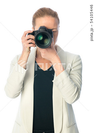 Beautiful young photographer with camera in professional studio 54105446