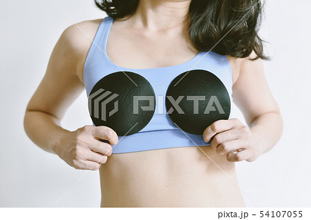 Upsize your breast, Woman in sportwear. 54107055
