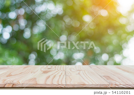 Empty wood table top and blur nature background Empty wood table top and blur nature background 54110201