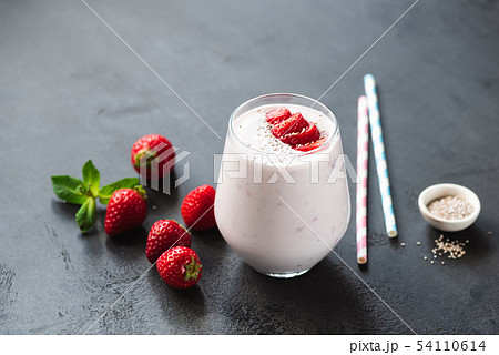 Tasty strawberry milkshake in glass Tasty strawberry milkshake in glass 54110614