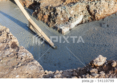 Trenches filled with concrete 54110799