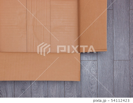 Flat lay of empty open cardboard box Flat lay of empty open cardboard box 54112423