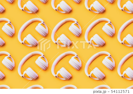 Wireless pink headphones on an yellow background. Wireless pink headphones on an yellow background. 54112571