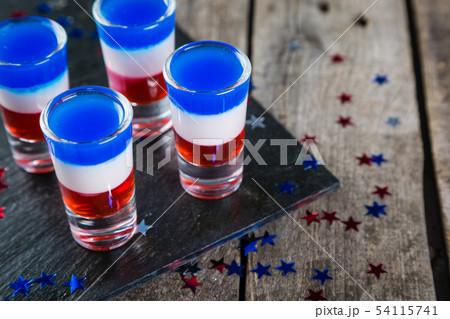 Independence day concept - flag coloured short cocktails on rustic background 54115741