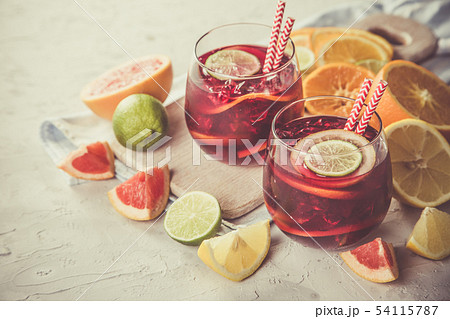 Sangria and ingredients in glasses Sangria and ingredients in glasses 54115787