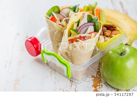 Lunch to go with tortilla wraps and vegetables 54117297