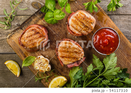 Roasted filet mignon with herbs and spices 54117310