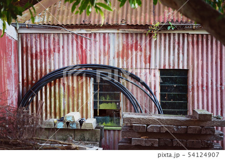 Rusty And Faded Old Country Storage Shack 54124907