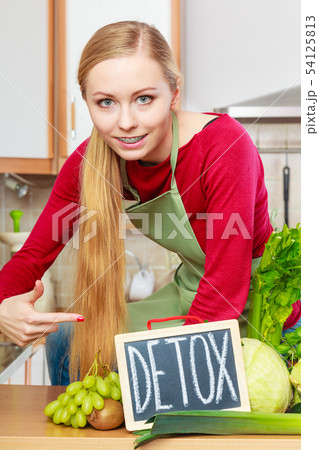 Woman having green diet vegetables, detox sign Woman having green diet vegetables, detox sign 54125813
