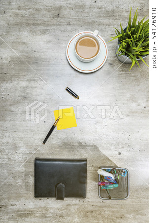 Top view of business desk with coffee Top view of business desk with coffee 54126910