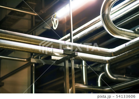 Stainless steel pipes in the factory. Construction 54133606