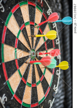 Colorful dart target game with one win arrow hit Colorful dart target game with one win arrow hit 54139967