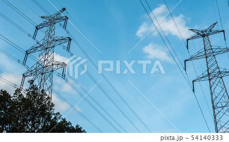 A high-voltage electricity pylons against blue sky A high-voltage electricity pylons against blue sky 54140333
