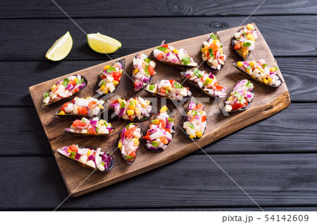 Traditional  Peruvian food background with mussels 54142609