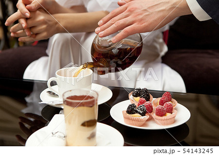 A man cares for a woman 54143245