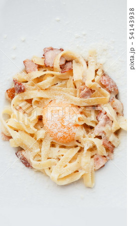 Traditional italian pasta carbonara with bacon and egg Traditional italian pasta carbonara with bacon and egg 54143938