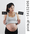 Happy Asian pregnant woman showing boy or girl 54152406