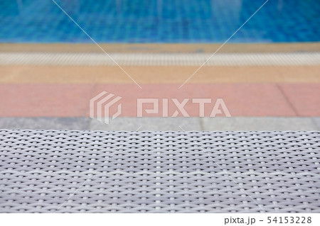 wicker rattan pool sun bed deckchair at swimming pool wicker rattan pool sun bed deckchair at swimming pool 54153228