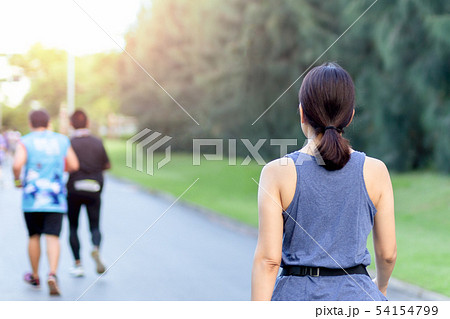 Woman exercise walking in the park in the morning. 54154799