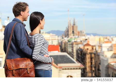 Barcelona - romantic couple looking at city view Barcelona - romantic couple looking at city view 54155037
