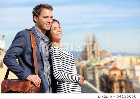 Happy romantic couple looking at view of Barcelona 54155050