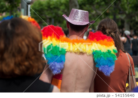 man wearing rainbow wings of angel  54155640
