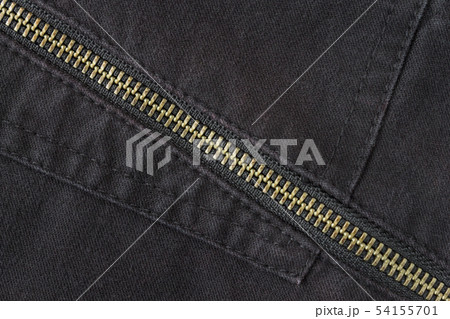 Brass Zip on Black Jeans Texture Background Brass Zip on Black Jeans Texture Background 54155701