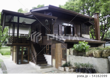 Beautiful Thai vintage style house and tropical Beautiful Thai vintage style house and tropical 54162099