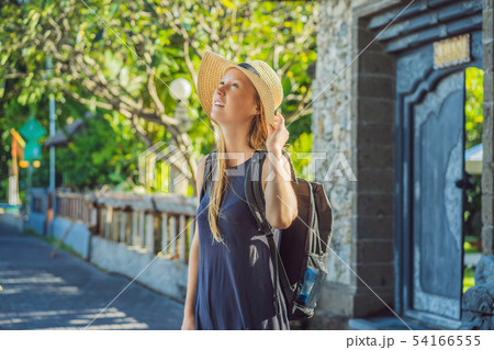 Woman traveler discovering Sanur, Bali Indonesia. Traveling with children concept 54166555