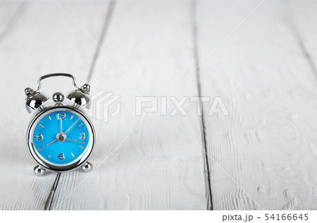 Alarm clock on wooden background with copy space Alarm clock on wooden background with copy space 54166645