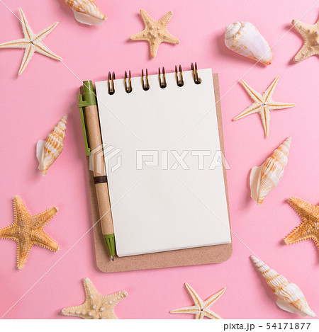 notebook with sseashells on pink background top notebook with sseashells on pink background top 54171877