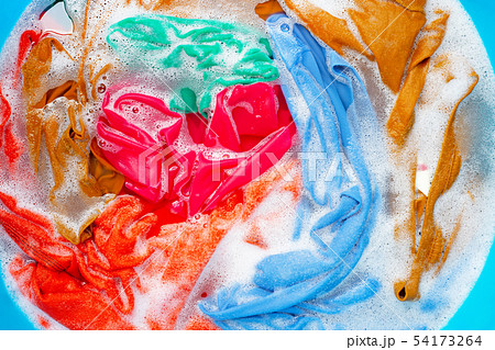 Color clothes soak before washing. 54173264
