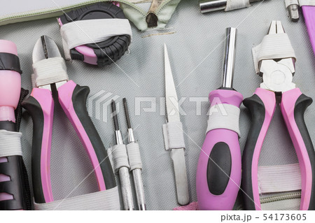 Tools for housework in toolbox. 54173605